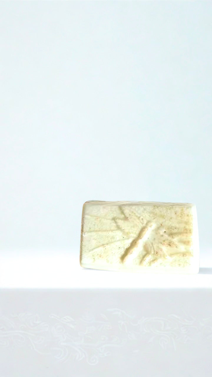Moonflower bar of soap on a white background