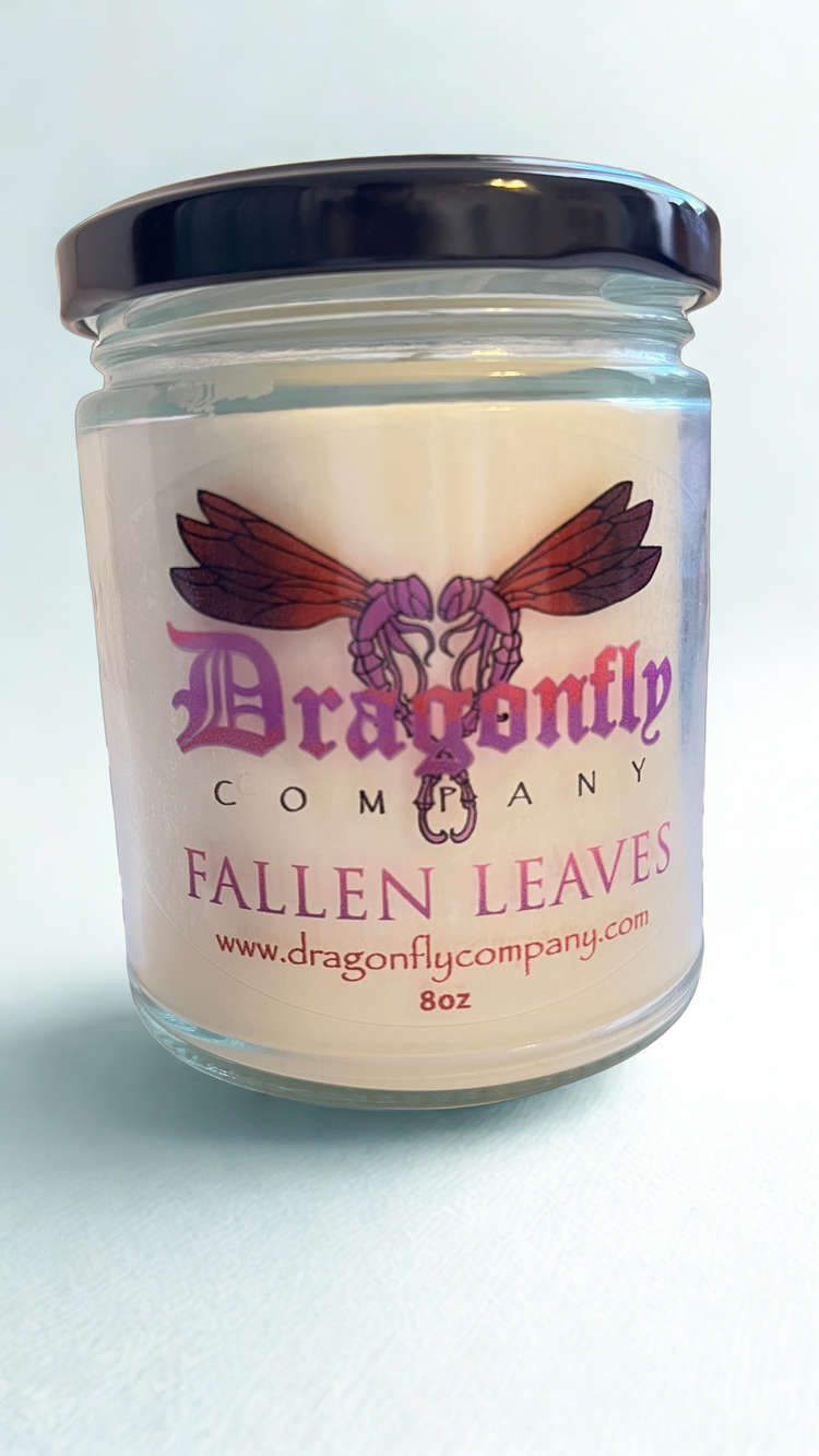 Candle jar Fallen Leaves  with 'Dragonfly Company' label on a white background