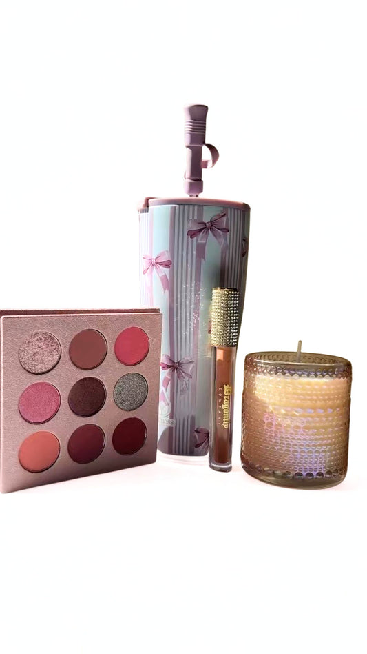 The princess collection includes  eyeshadow palette, lipgloss , and candle and tumbler on a white background