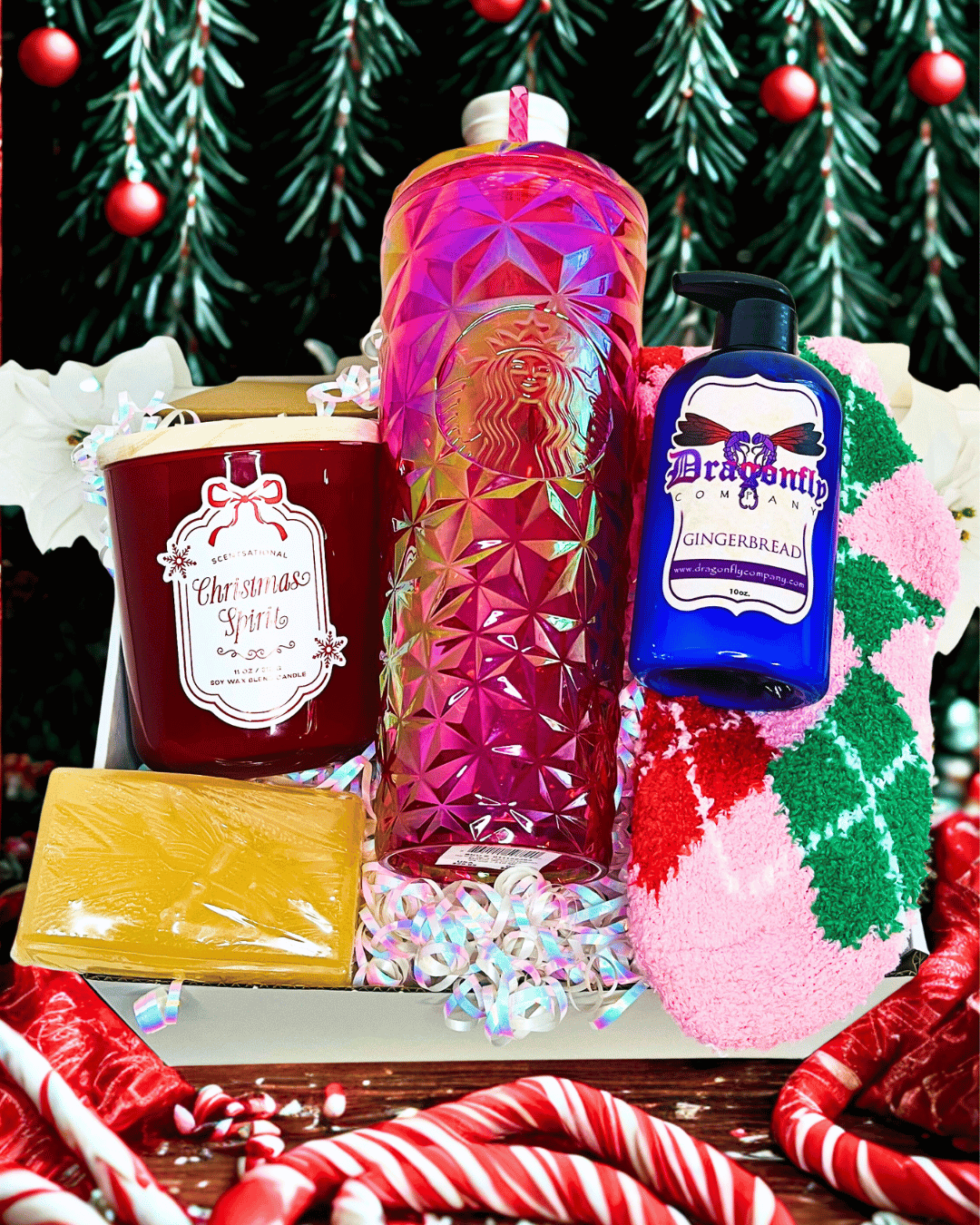 “Starbucks Christmas gift set with iridescent tumbler, peppermint candle, gingerbread lotion, gingerbread soap, and cozy slippers.”