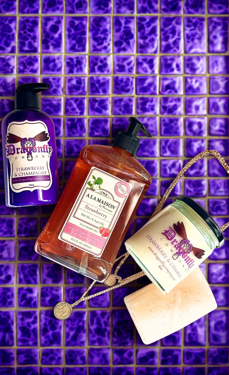 Strawberry and Champagne bundle and a necklace on purple tile 