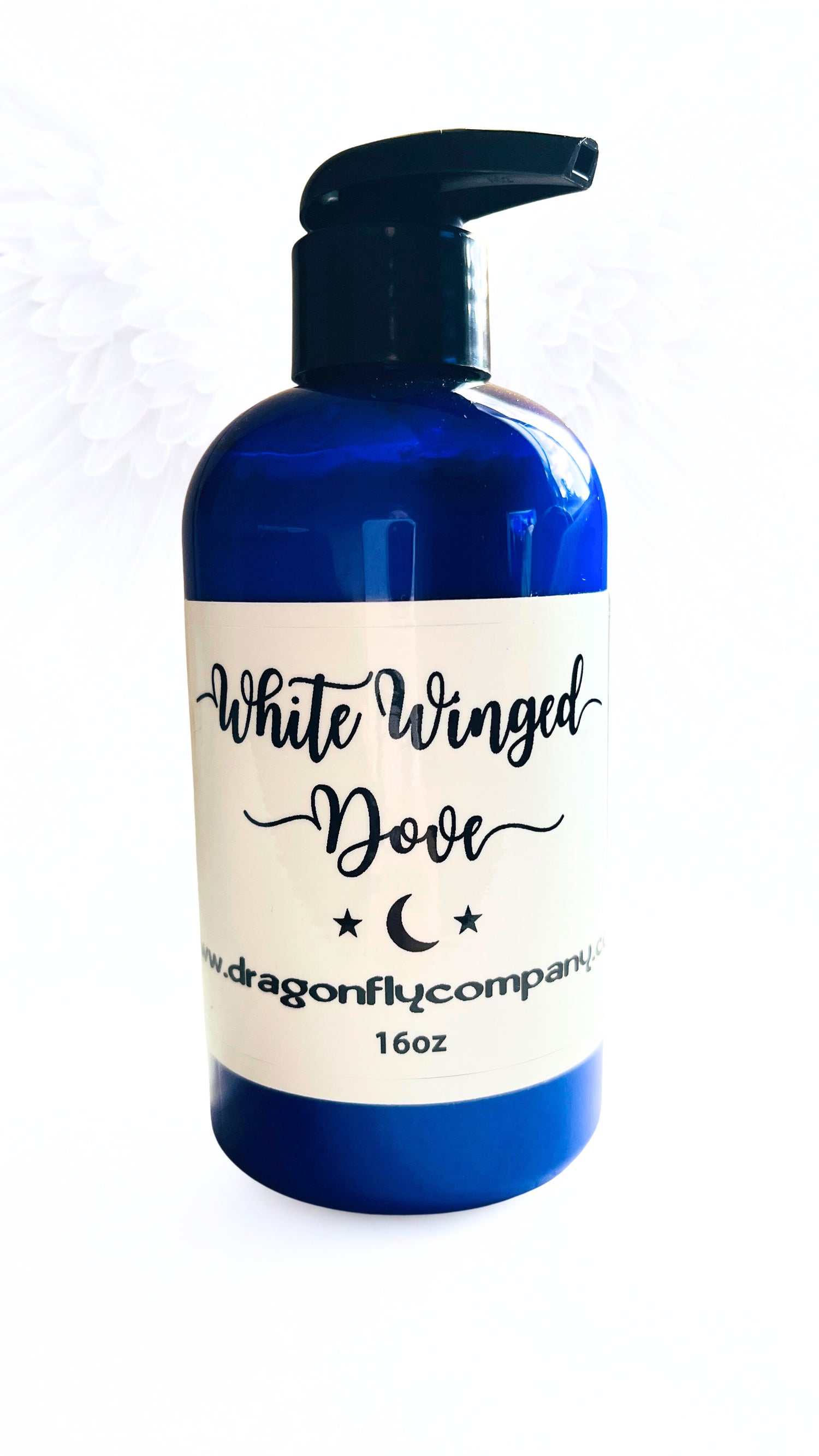 Blue bottle  of lotion with a label on a white background