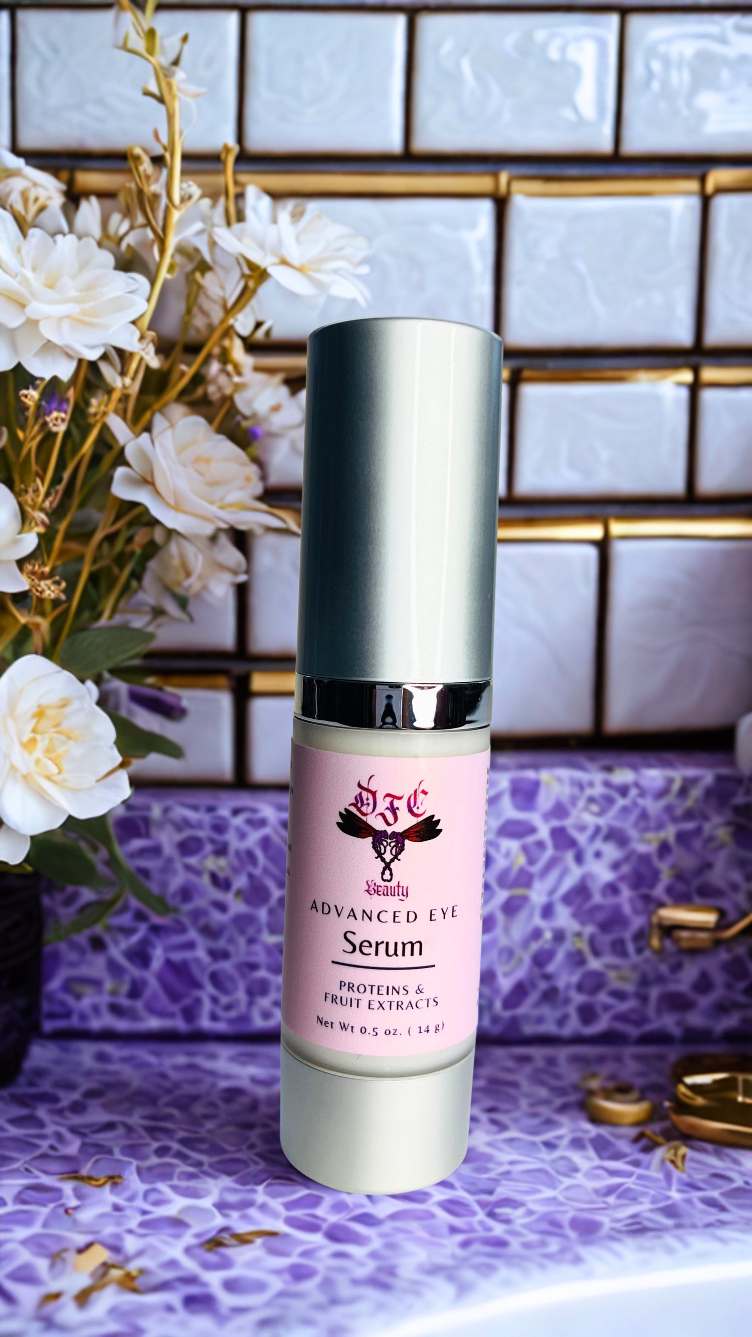 A bottle of Advanced Eye Serum stands on a purple patterned surface with a tiled wall and white flowers in the background.