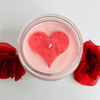 Love potion candle has a unique floating heart in the center .