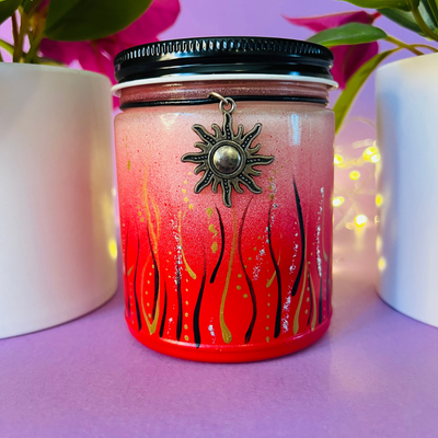 An artistic candle that is hand painted by me with a cute bracelet .